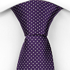 A purple necktie with white dots